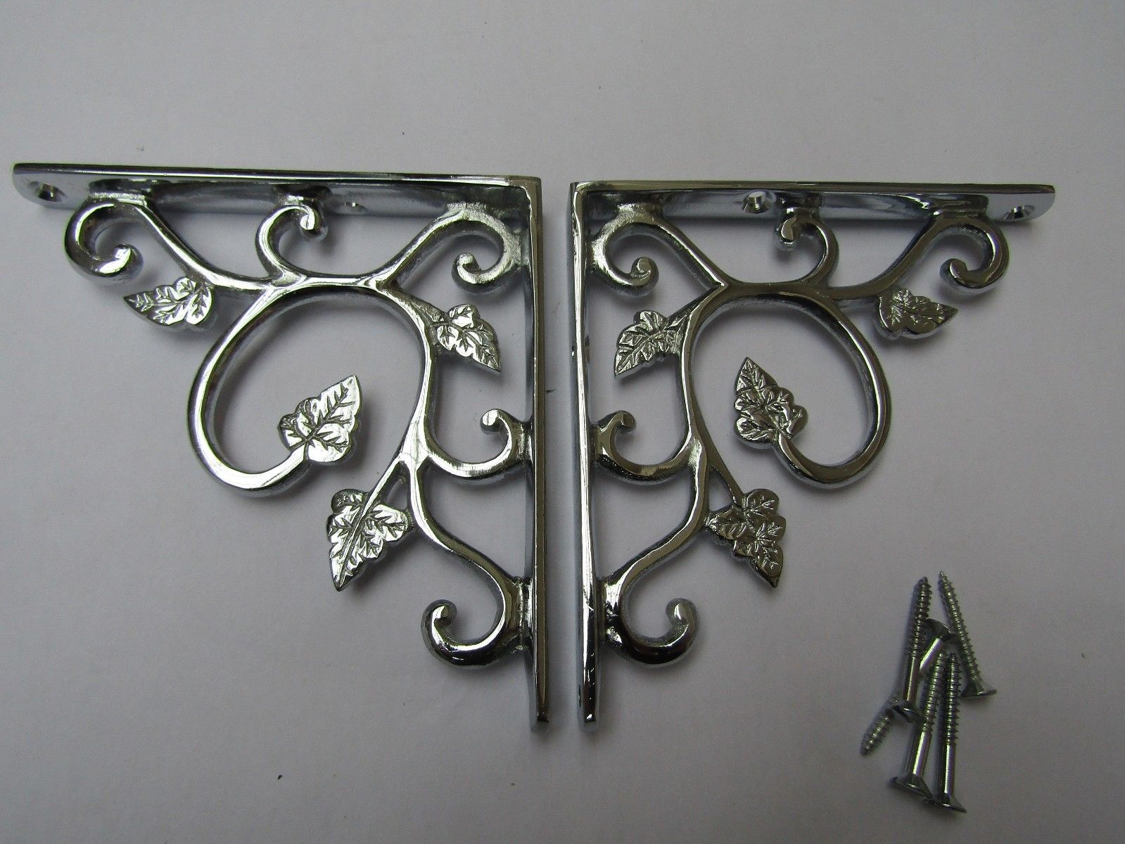 Pair Of Small Leaf Shelf Brackets Polished Chrome.