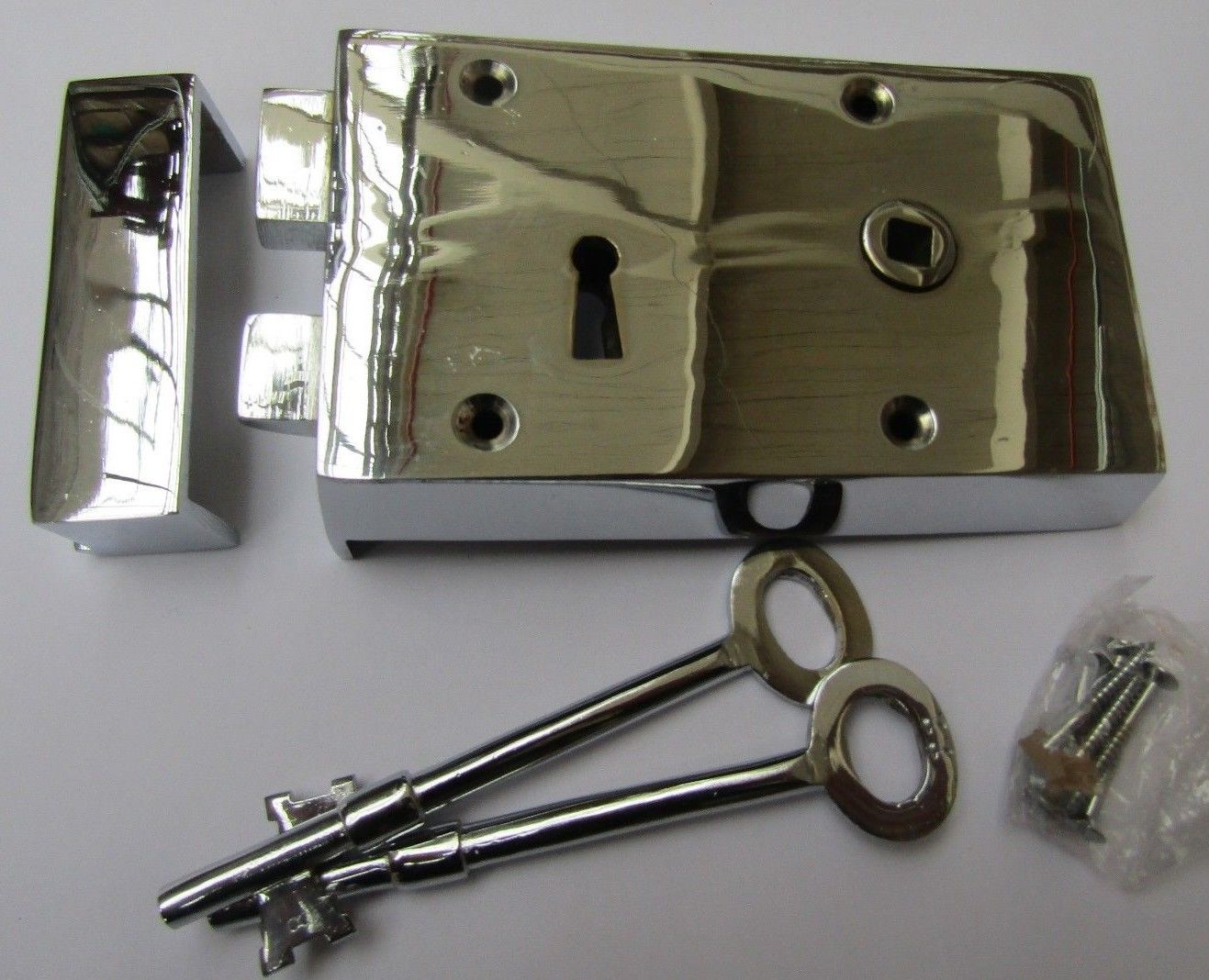 Solid Brass Construction Left hand Rim Lock Polished Chrome.