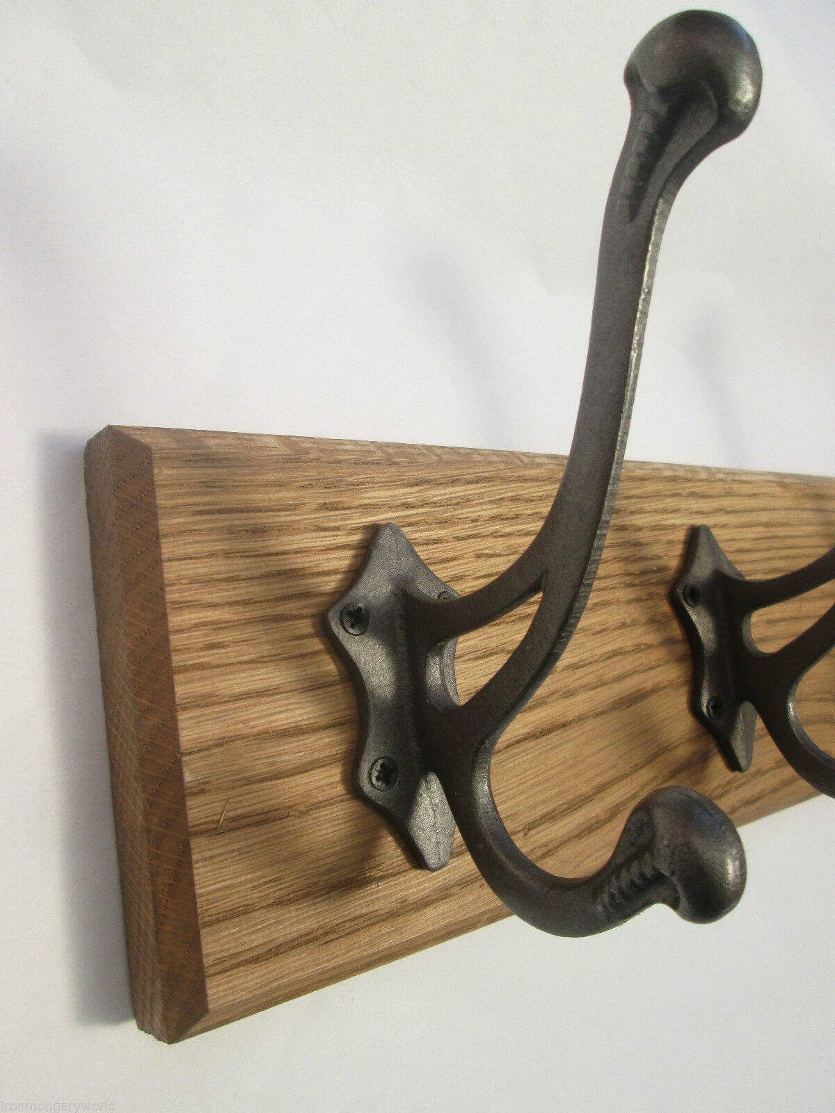 Antique Iron Lincoln 8 Hook Coat Rail 88cm.