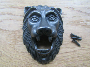 Cast Iron Lion Head Bottle Opener.