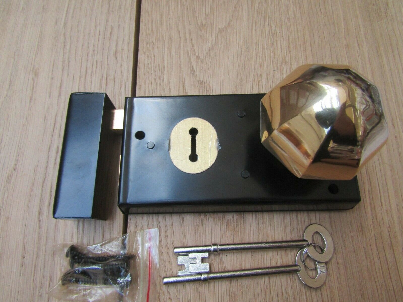 5.5inch Rim Lock Black & Octagonal Rim Brass Set.