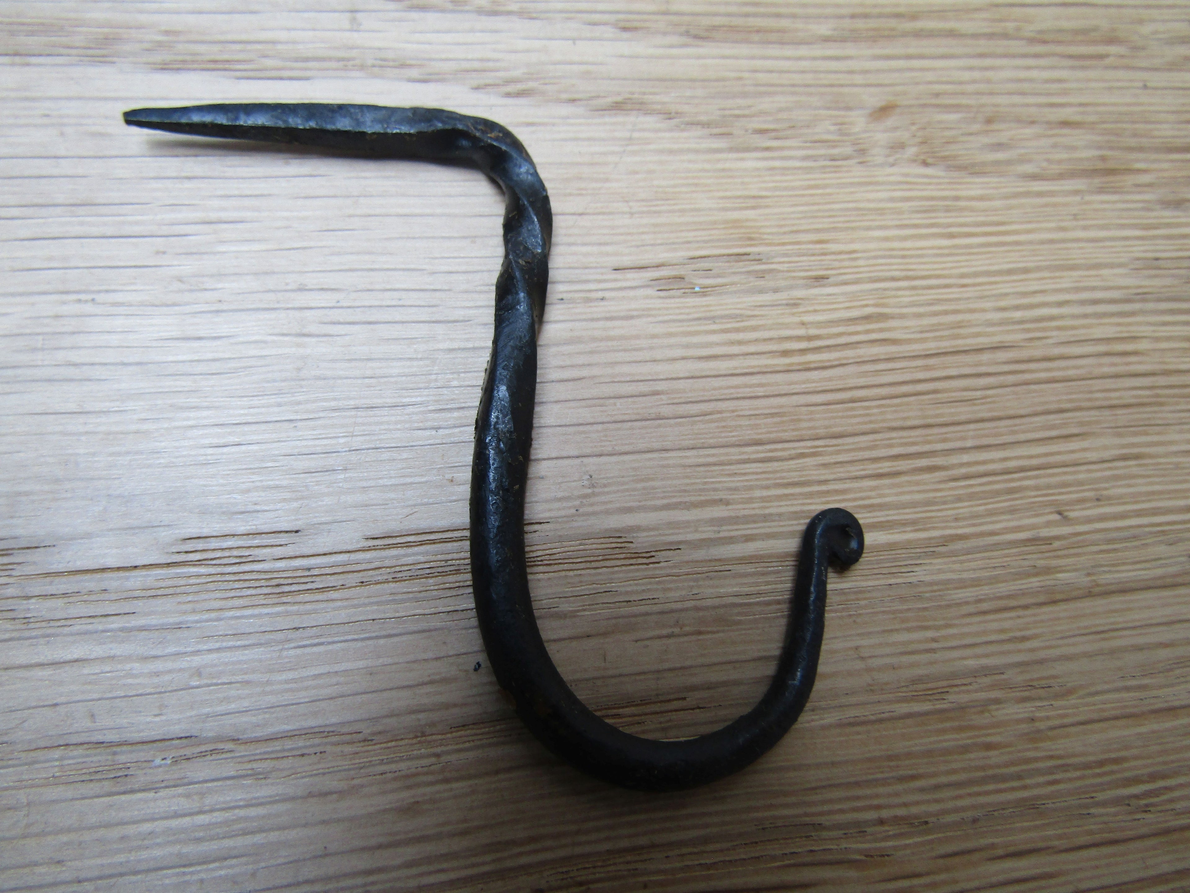 Hand Forged Nail in Hook black wax 60mm.