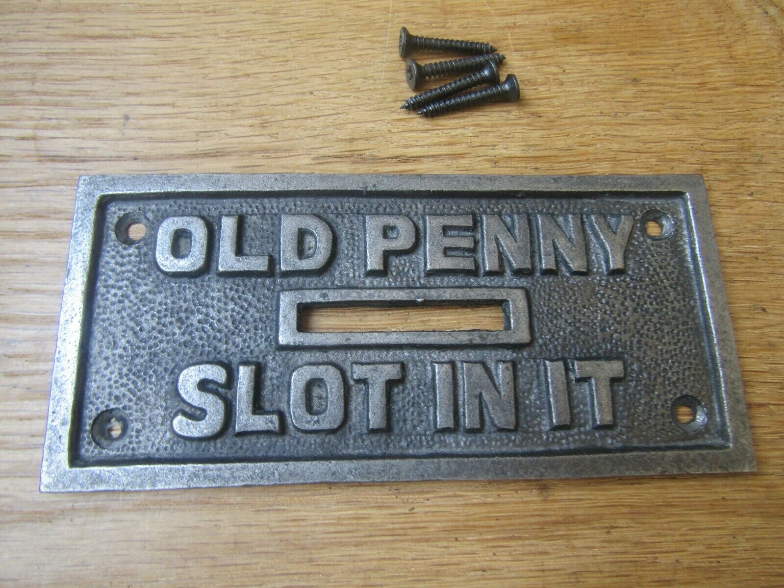 Cast Iron Old Penny Slot In It Plaque.