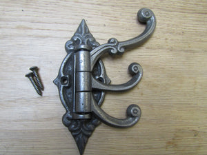 Ornate Swivel Arm Hook Antique Iron.