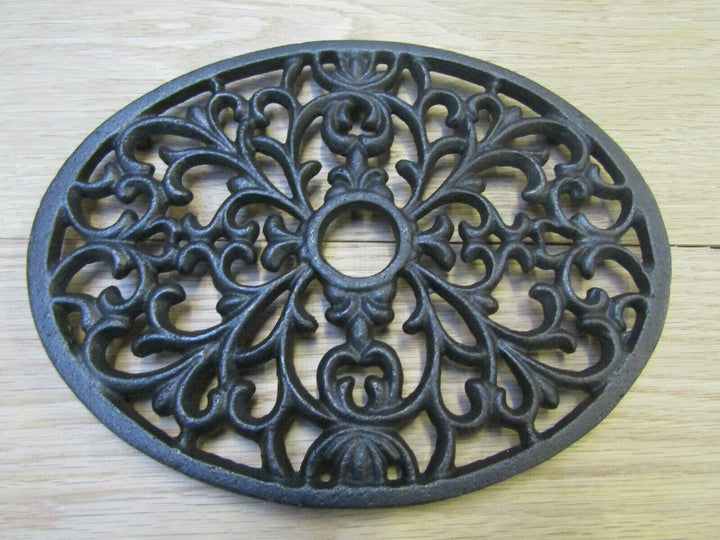 Cast Iron Oval Decorative Trivet.