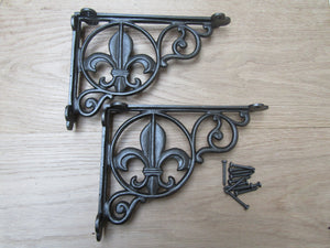 Pair Of Fleur De Lys Shelf Brackets Antique Iron.