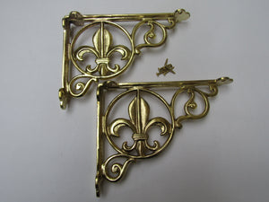 Pair Of Fleur De Lys Shelf Brackets Brass.