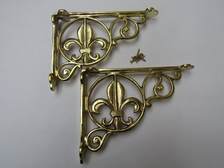 Pair Of Fleur De Lys Shelf Brackets Brass.