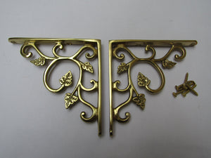 Pair Of Small Leaf Shelf Brackets Polished Brass.