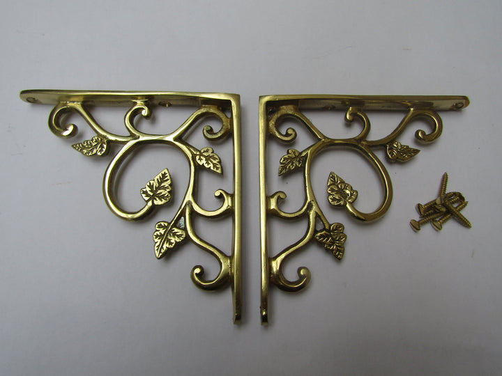 Pair Of Small Leaf Shelf Brackets Polished Brass.