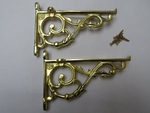 Pair Of Small Lipped Shelf Brackets Polished Brass.