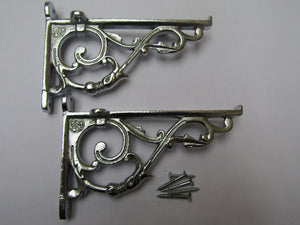 Pair Of Small Lipped Shelf Brackets Polished Chrome.