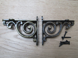 Pair Of Swirl Shelf Brackets Antique Brass.