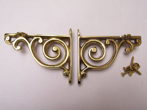 Pair Of Swirl Shelf Brackets Polished Brass.