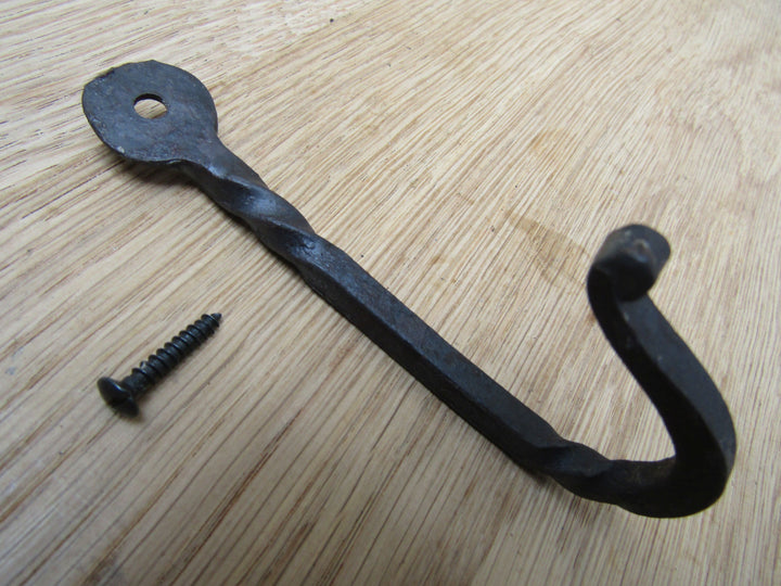 Hand Forged Penny End Twisted hook Black wax.