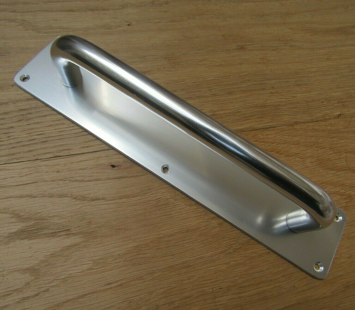 Plain Handle on Plate polished aluminium.