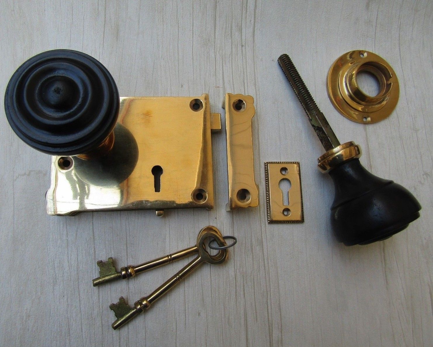East Lake Rim Lock & Bun Rimmed Ebony + Brass Set.