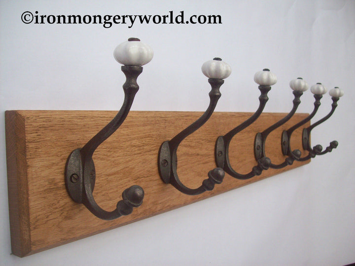 Small White Ceramic Pumpkin 7 Hook Coat Rail 78cm.