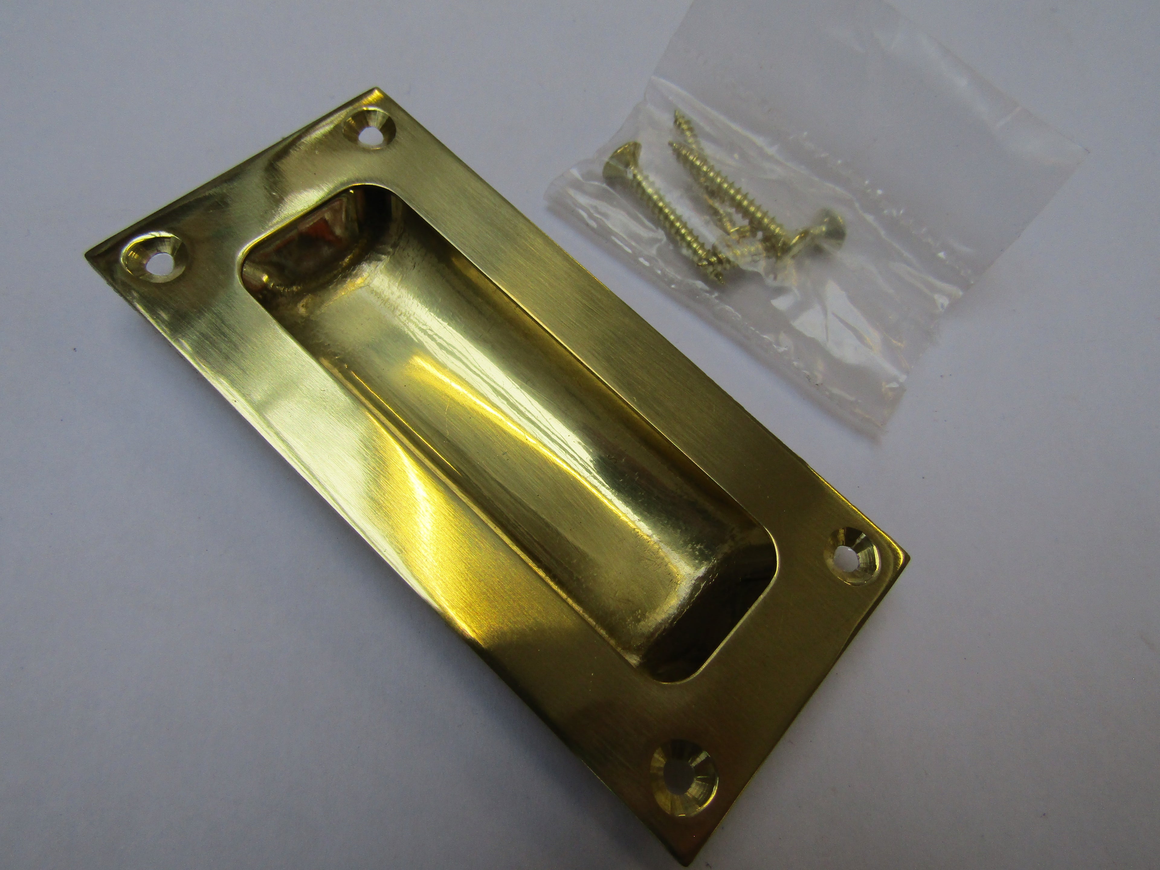 90mm Rectangular Recessed Slide Handle polished brass.