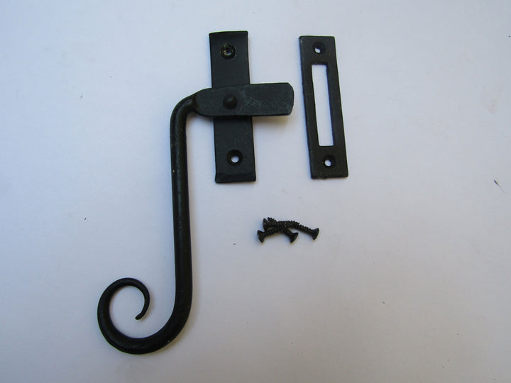 Handforged Curly Left hand Window Fastener Black Beeswax.