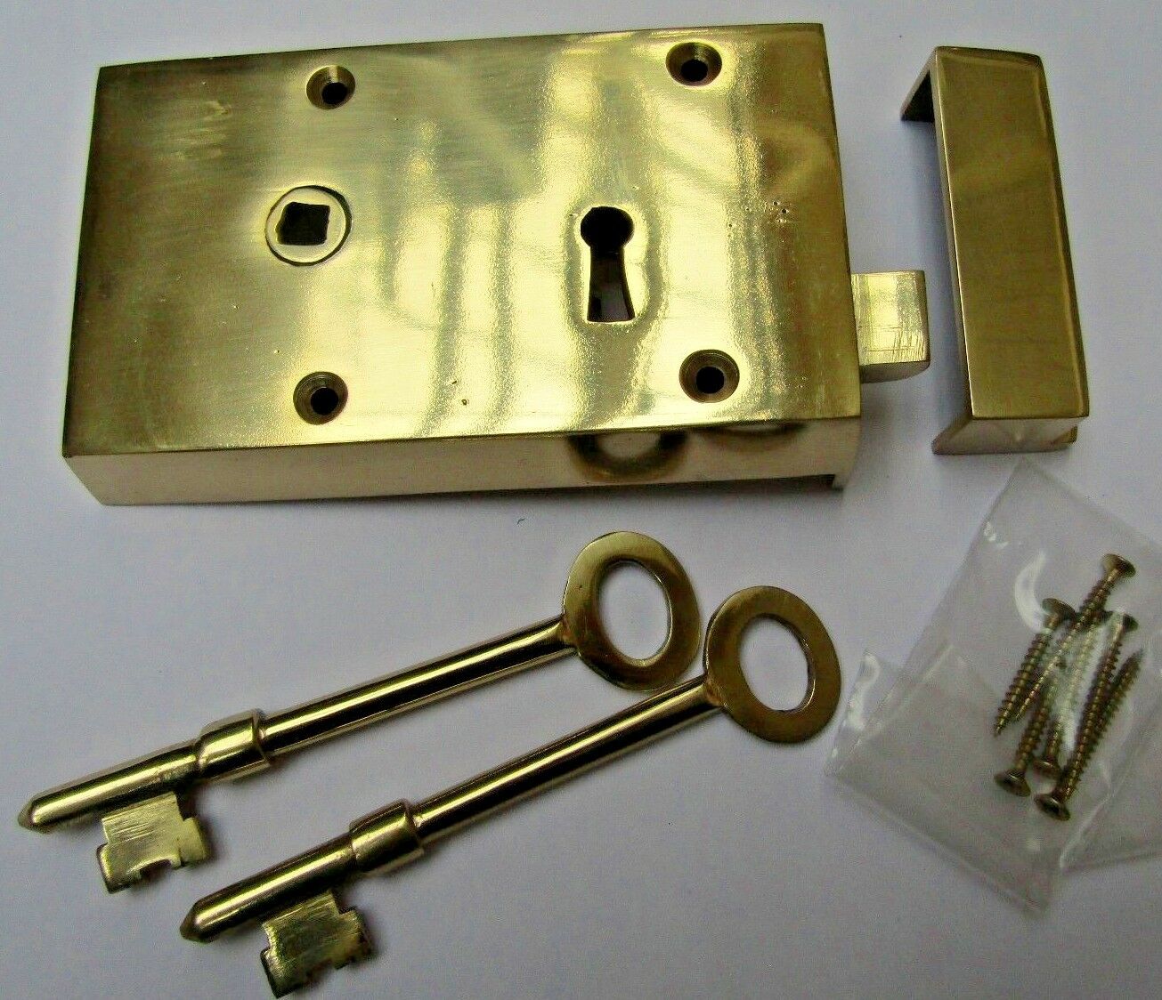 Solid Brass Construction Right hand Rim Lock Polished Brass.