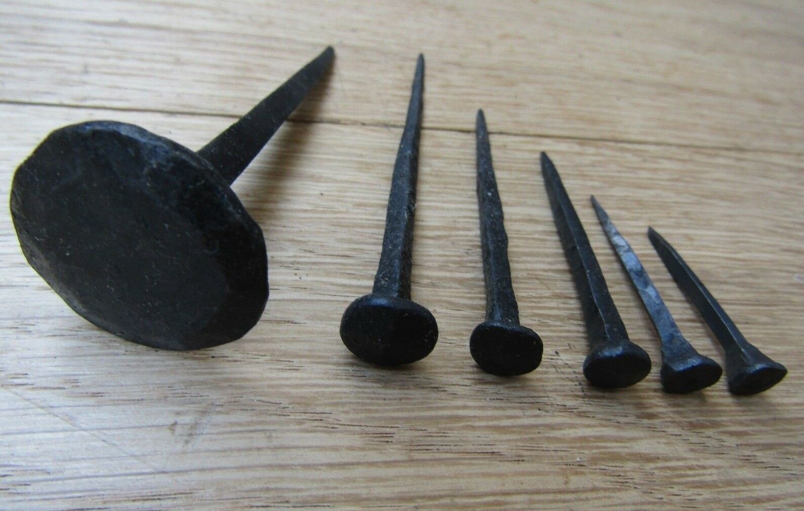Pack of 10 1inch Rose Head Furniture Nails Black Wax.