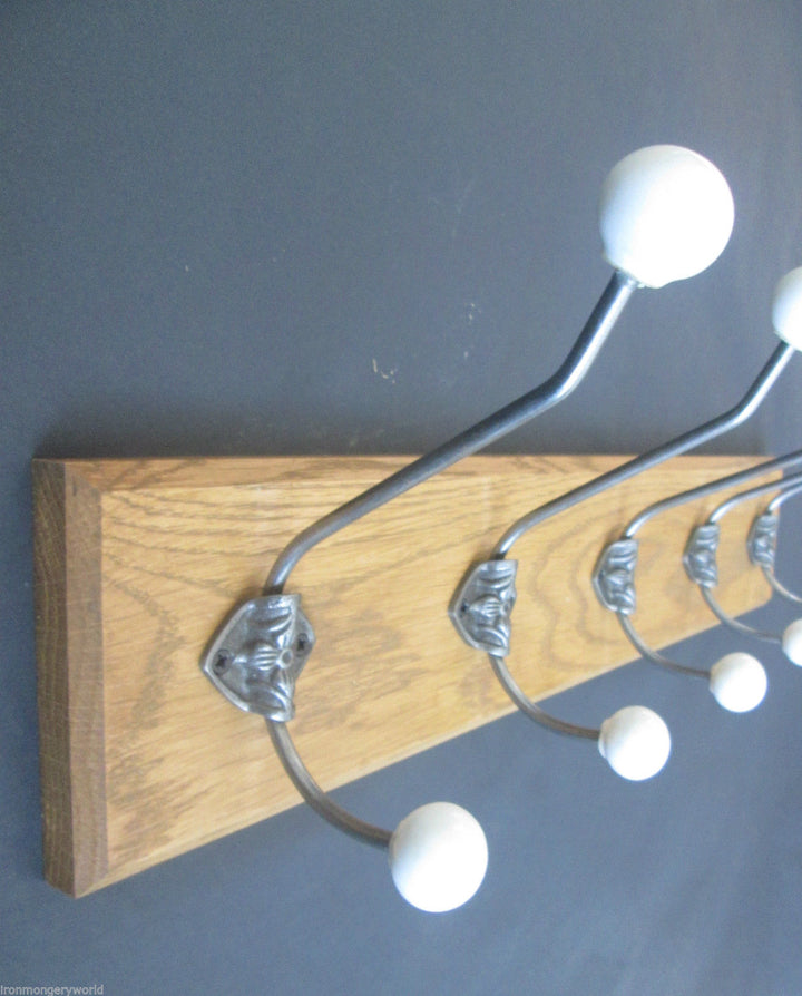 White Rossete 6 Hook Coat Rail 68cm.