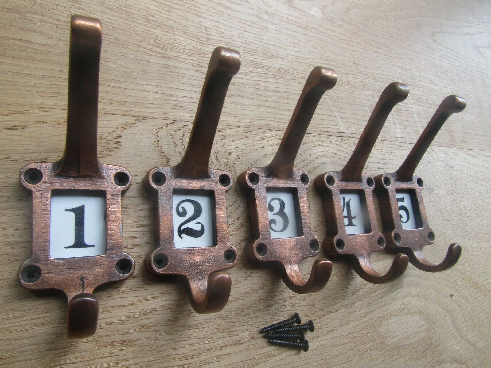 Ceramic Insert 1-5 Numbered Antique Copper Coat Hooks.