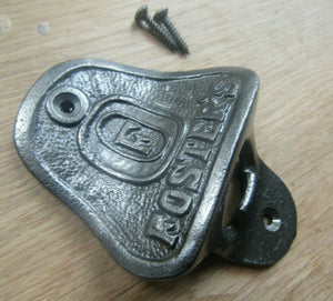 Cast Iron Foster's Bottle Opener.