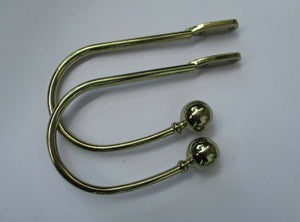 Pair of ball end Curtain hold backs Polished Brass.