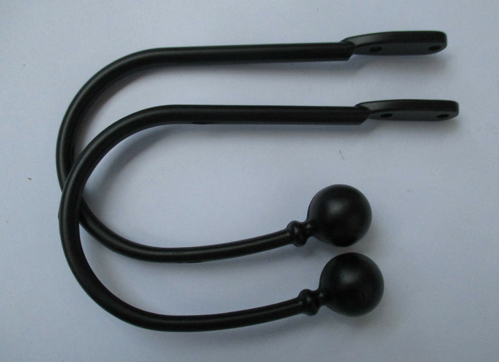 Pair of ball end Curtain hold backs Black.