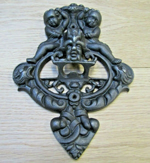 Figurine Cast Iron Bottle Opener.