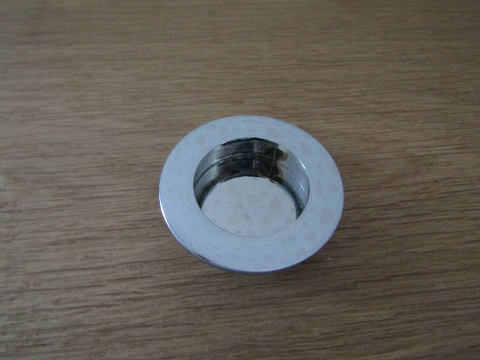 Small Round Recessed Flush Pull Polished Steel.