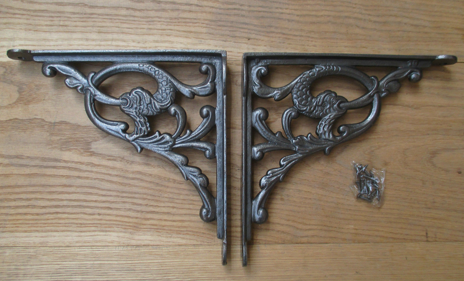 Pair Of Serpent Shelf Brackets Antique Iron.