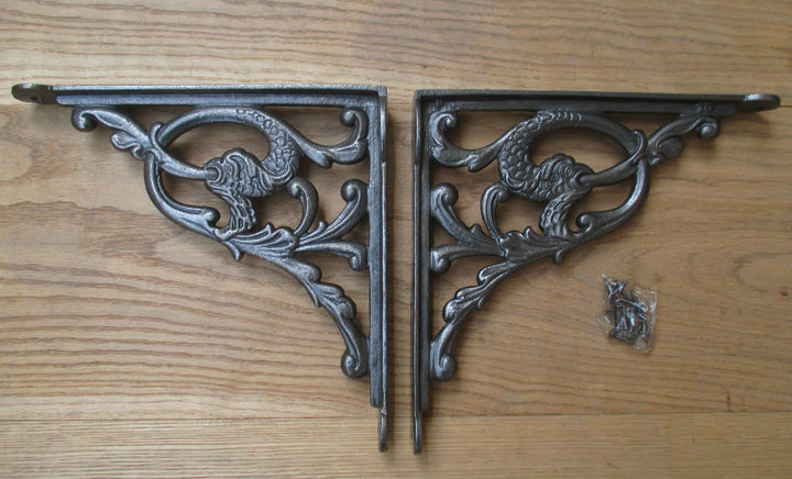 Pair Of Serpent Shelf Brackets Antique Iron.