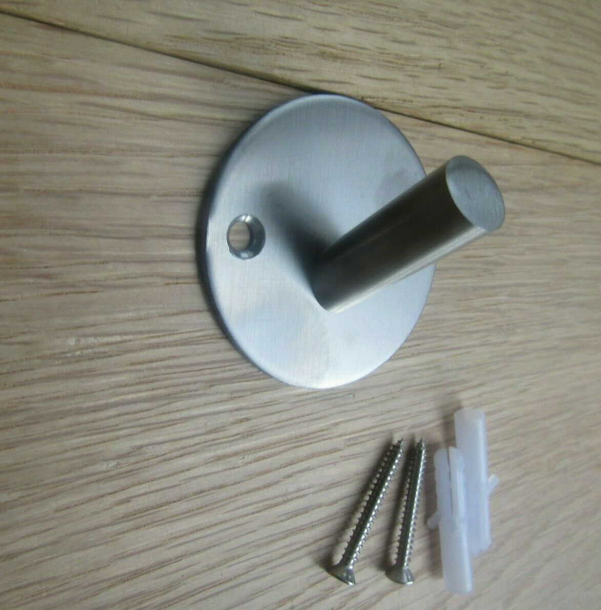 Satin Stainless Steel Single Peg on Base Hook.