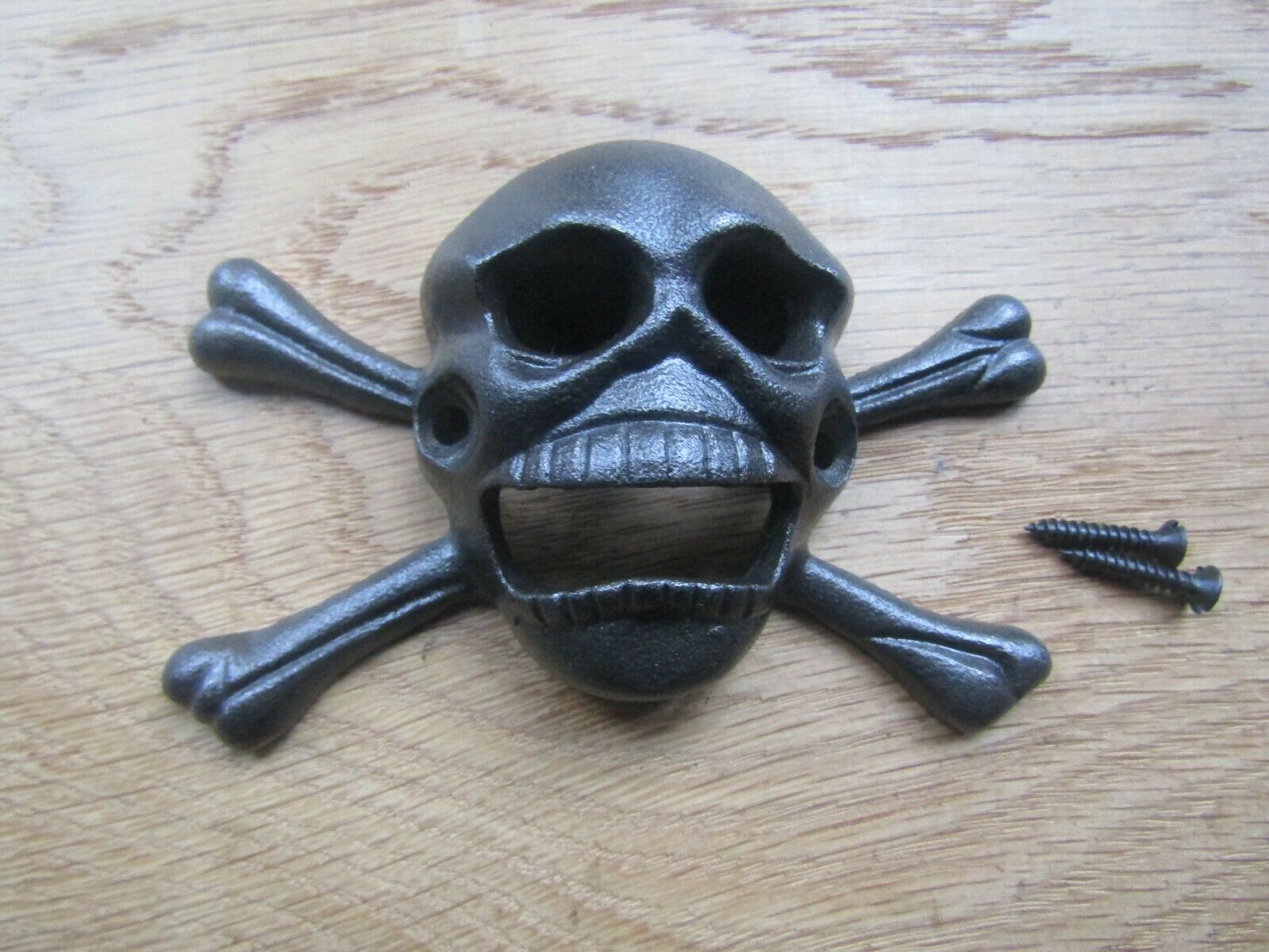 Cast Iron Skull Bones Bottle Opener.