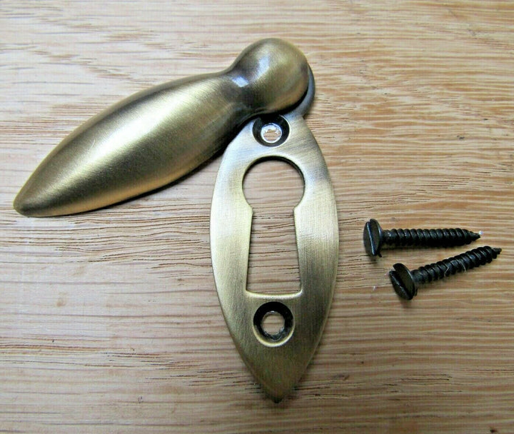 Slim Tear Drop Escutcheon Antique Brass.