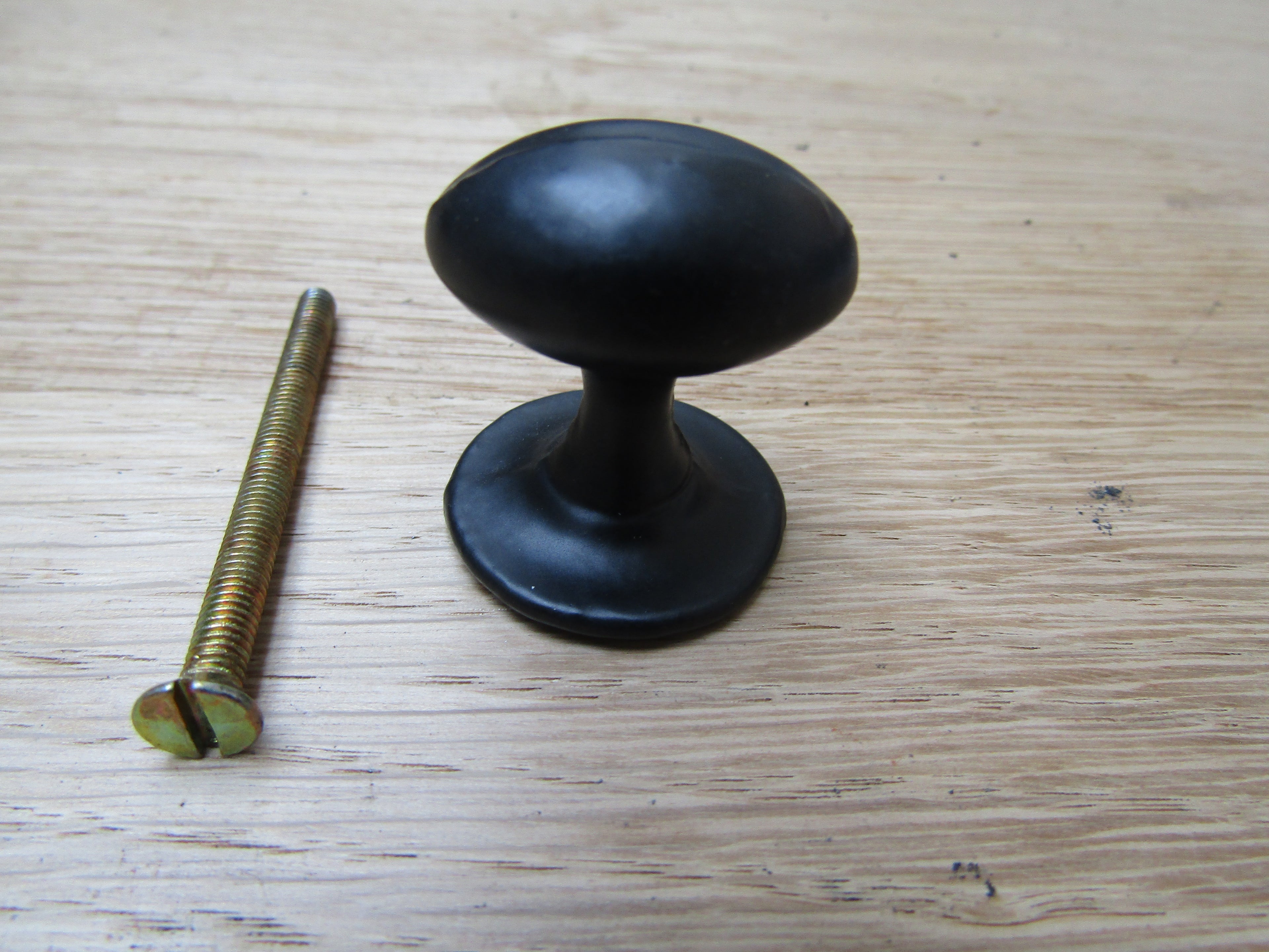 Small Oval with Base Cupboard Knob Black Antique 30mm.