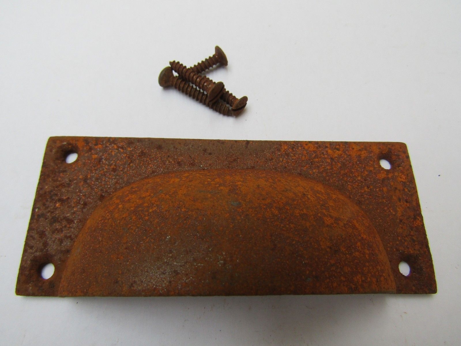 Small Rectangular Cup Handle Rust on Iron.