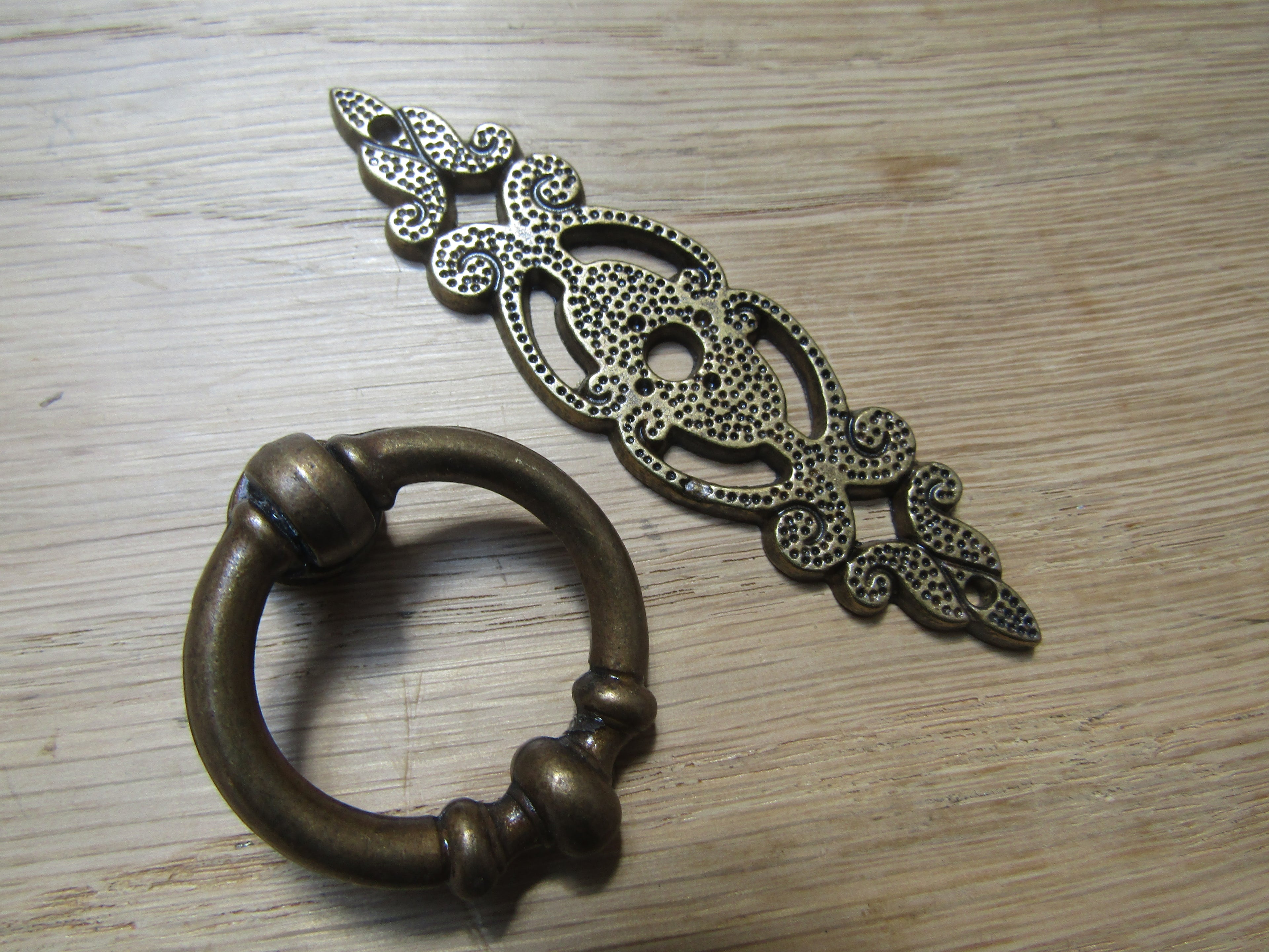 Small Ring Pull On Backplate Antique Brass.