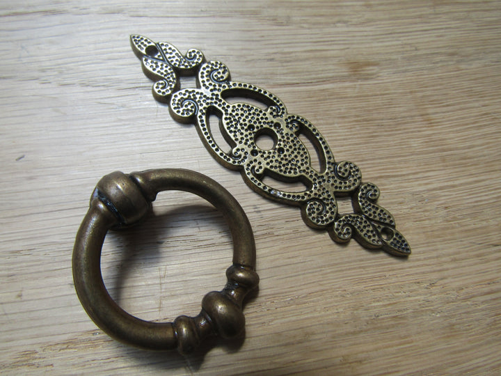 Small Ring Pull On Backplate Antique Brass.