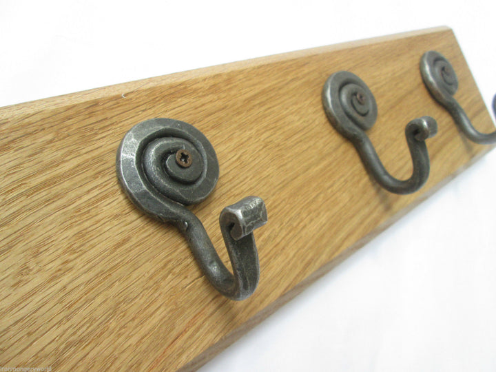 Antique Iron Snail 8 Hook Coat Rail 88cm.