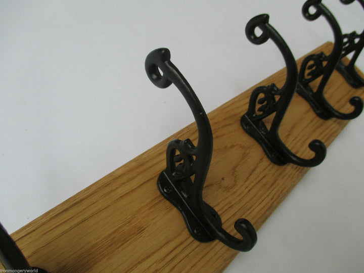 Black Antique Swan P 4 Hook Coat Rail 48cm.