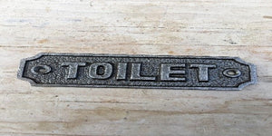 Cast Iron Toilet Plaque.