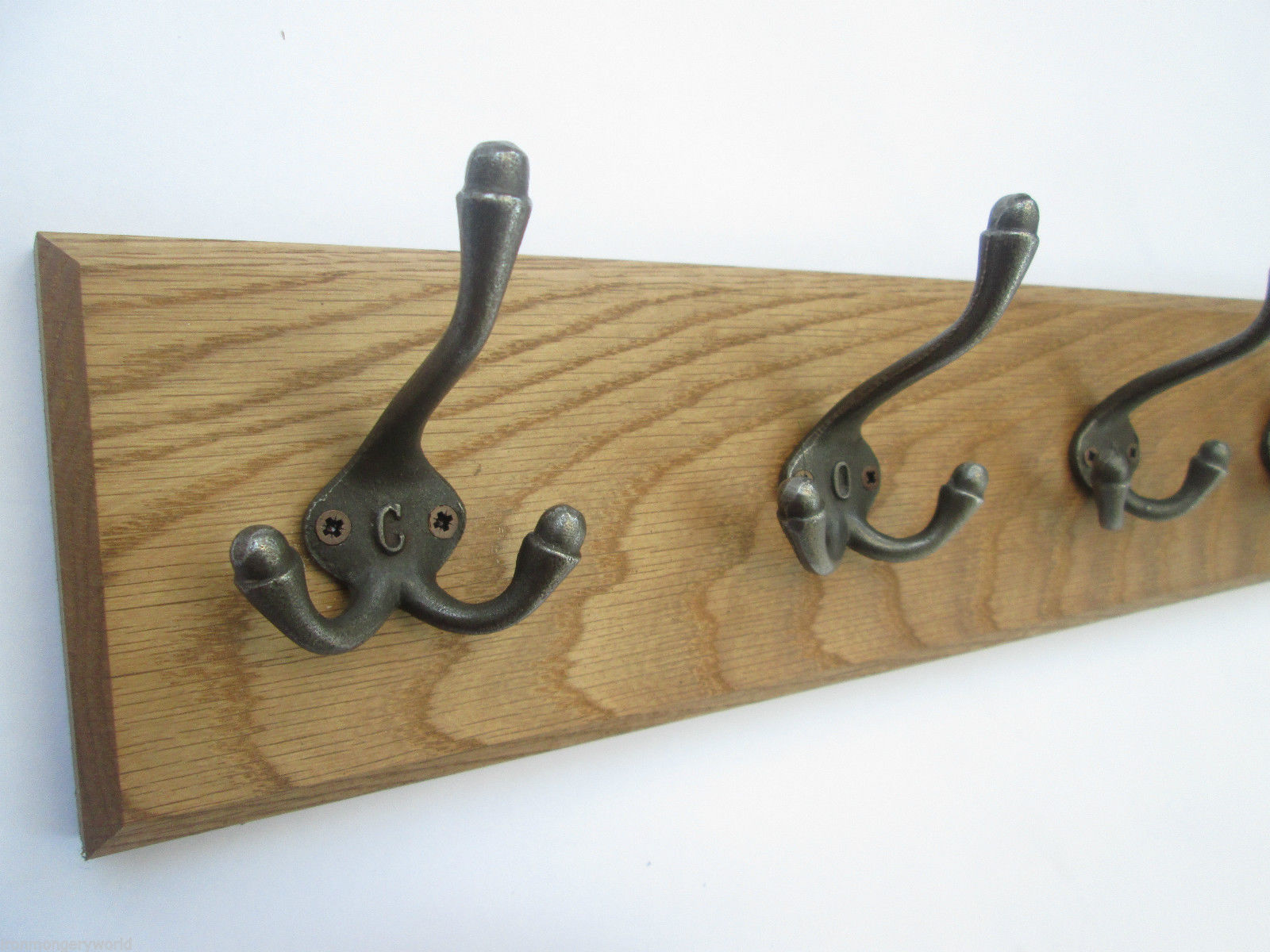 Cast iron Triple Lettered 7 Hook Coat Rail 78cm.